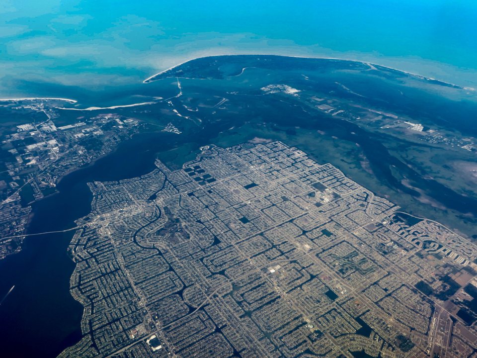 Aerial view of Cape Coral canal neighborhoods and surrounding waterways
