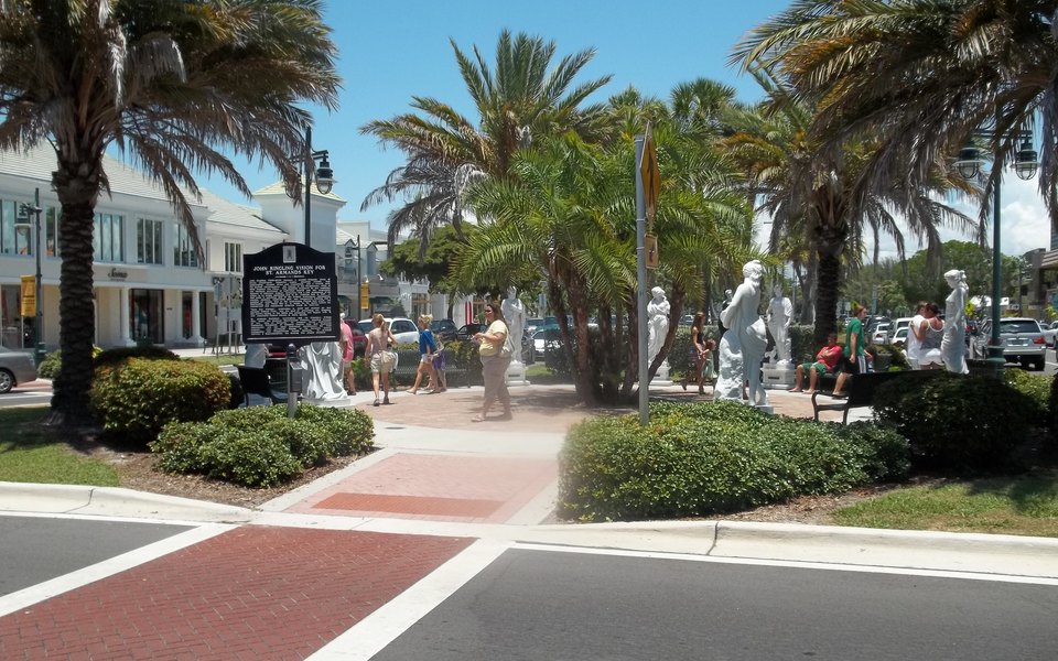 Statue and landscaped walkway at St. Armands Circle in Sarasota, Florida